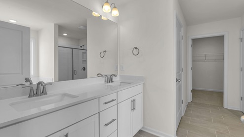 bathroom with quartz countertops