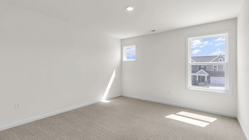 loft with carpet flooring
