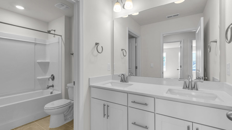bathroom with quartz countertops