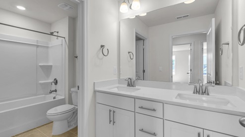 bathroom with quartz countertops