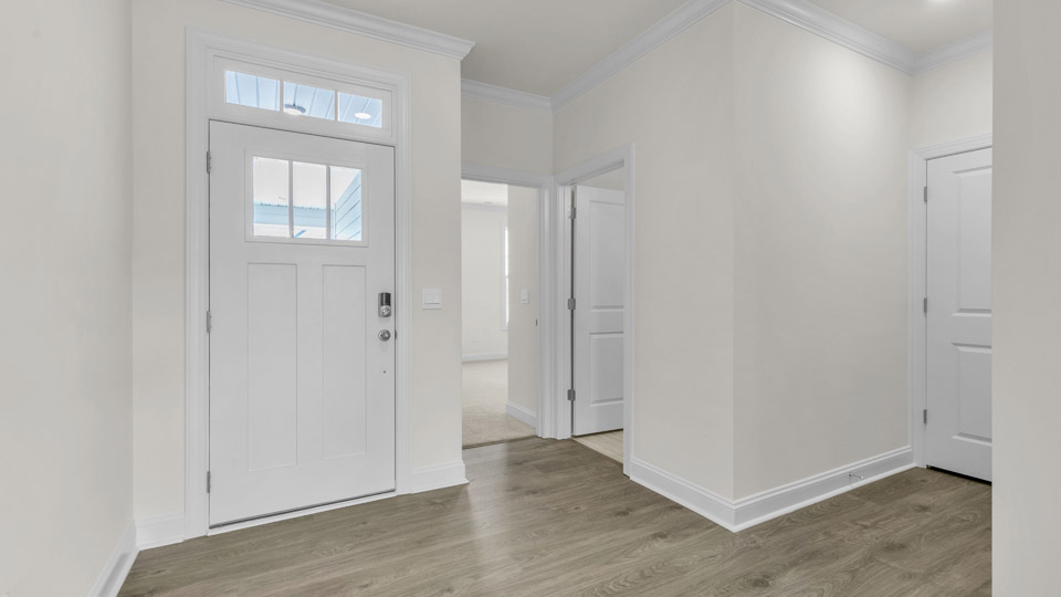 foyer with revwood flooring
