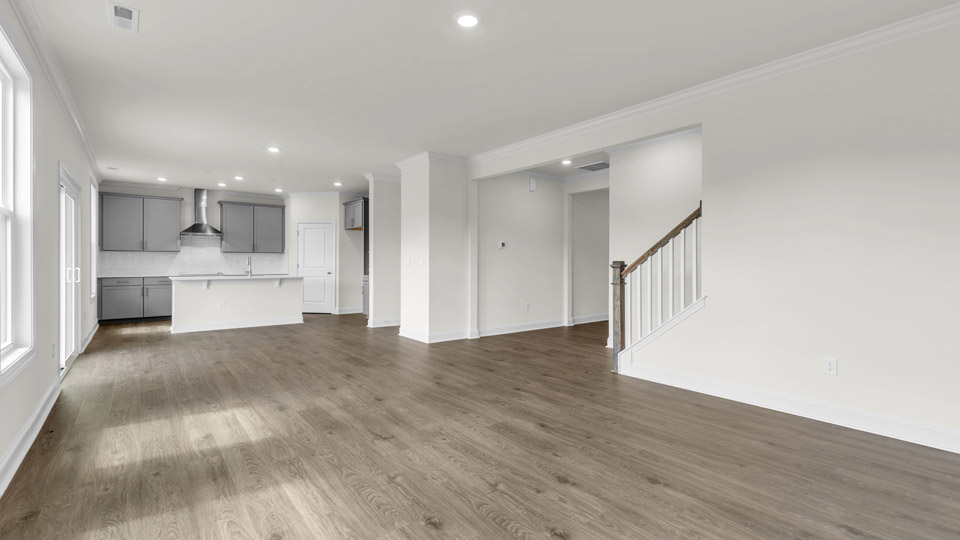 living room with revwood flooring