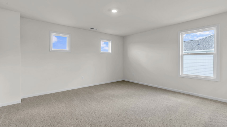 loft with carpet flooring