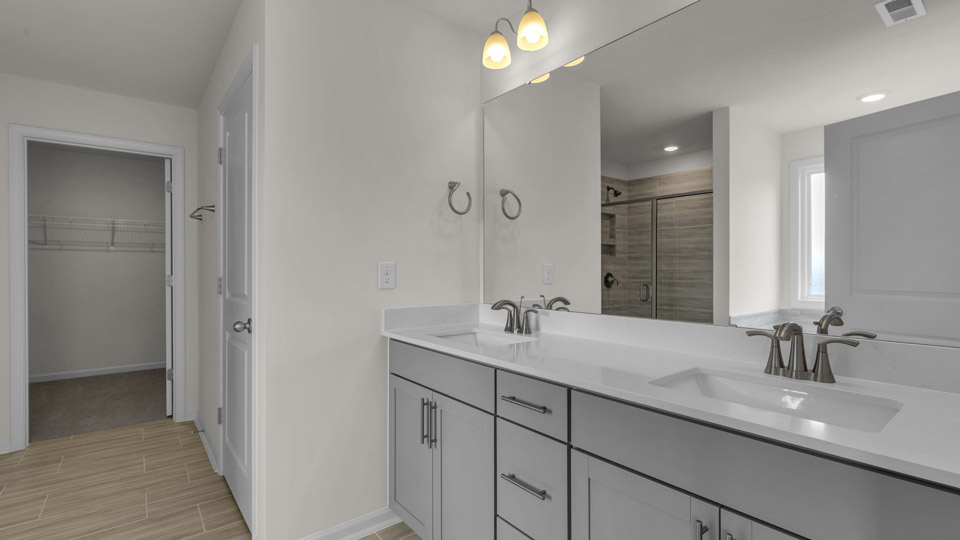 bathroom with quartz countertops