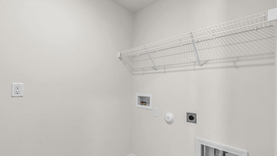 laundry room with wash and dryer hookups