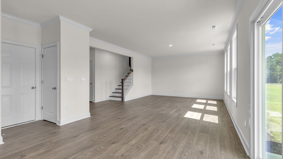 living room with revwood flooring