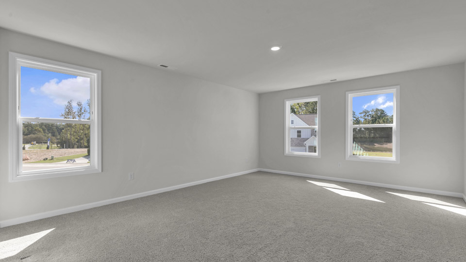 loft with carpet flooring