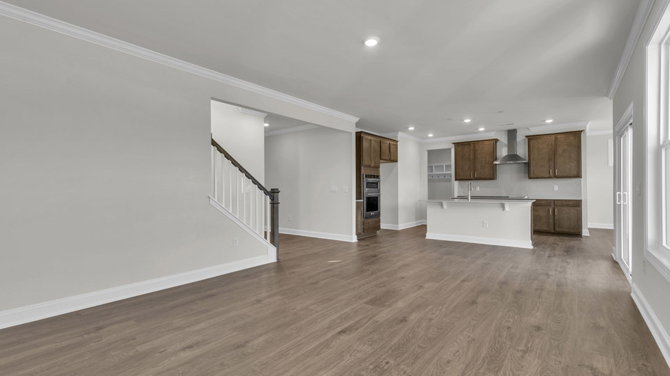 living room with revwood flooring
