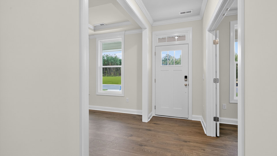 Foyer entryway with revwood flooring