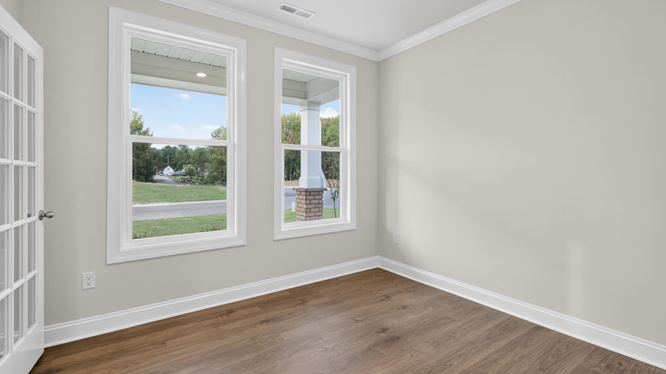 study with french doors and revwood flooring