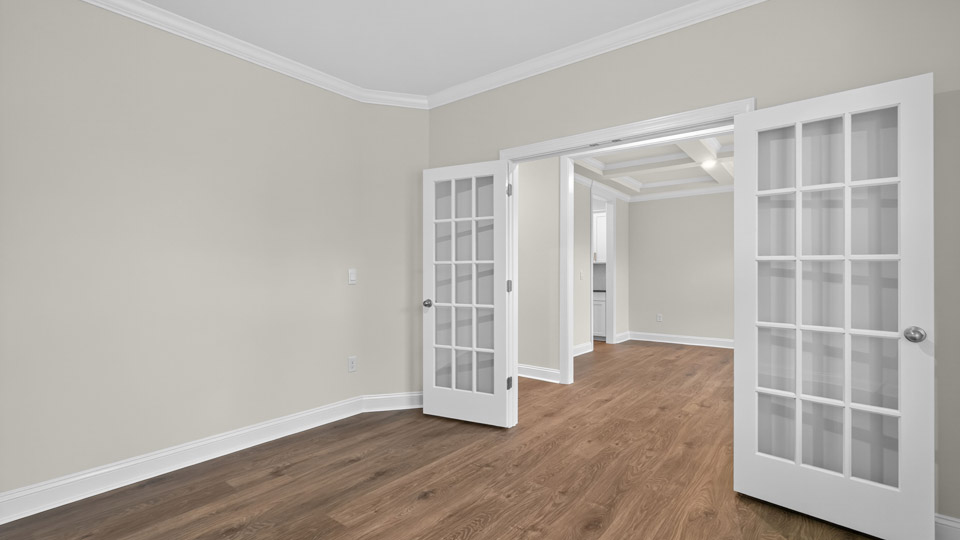 study with french doors and revwood flooring