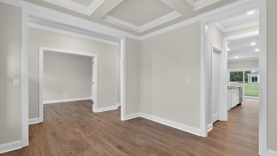 dining room with coffered ceiling