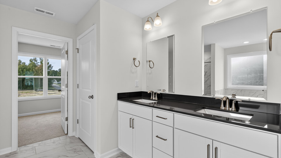 bathroom with quartz countertops