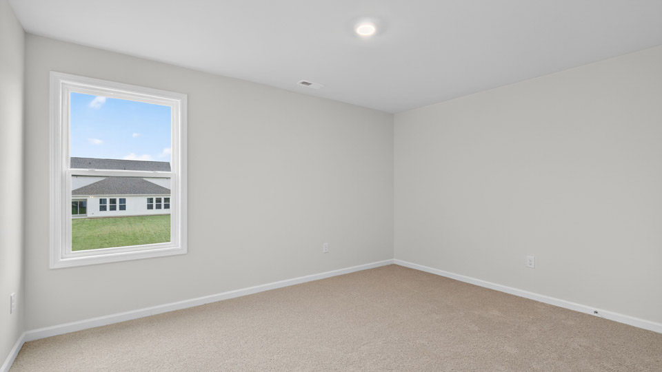 loft with carpet flooring