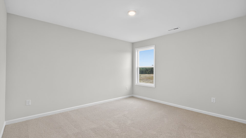loft with carpet flooring