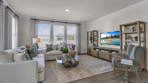 open concept living space with large windows