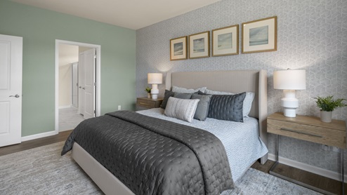 Bedroom with natural lighting and carpet flooring