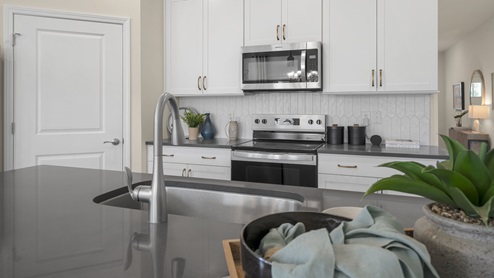 Kitchen with stainless steel appliances and granite countertops