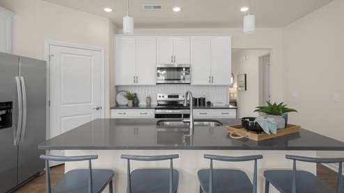 Kitchen with stainless steel appliances and granite countertops