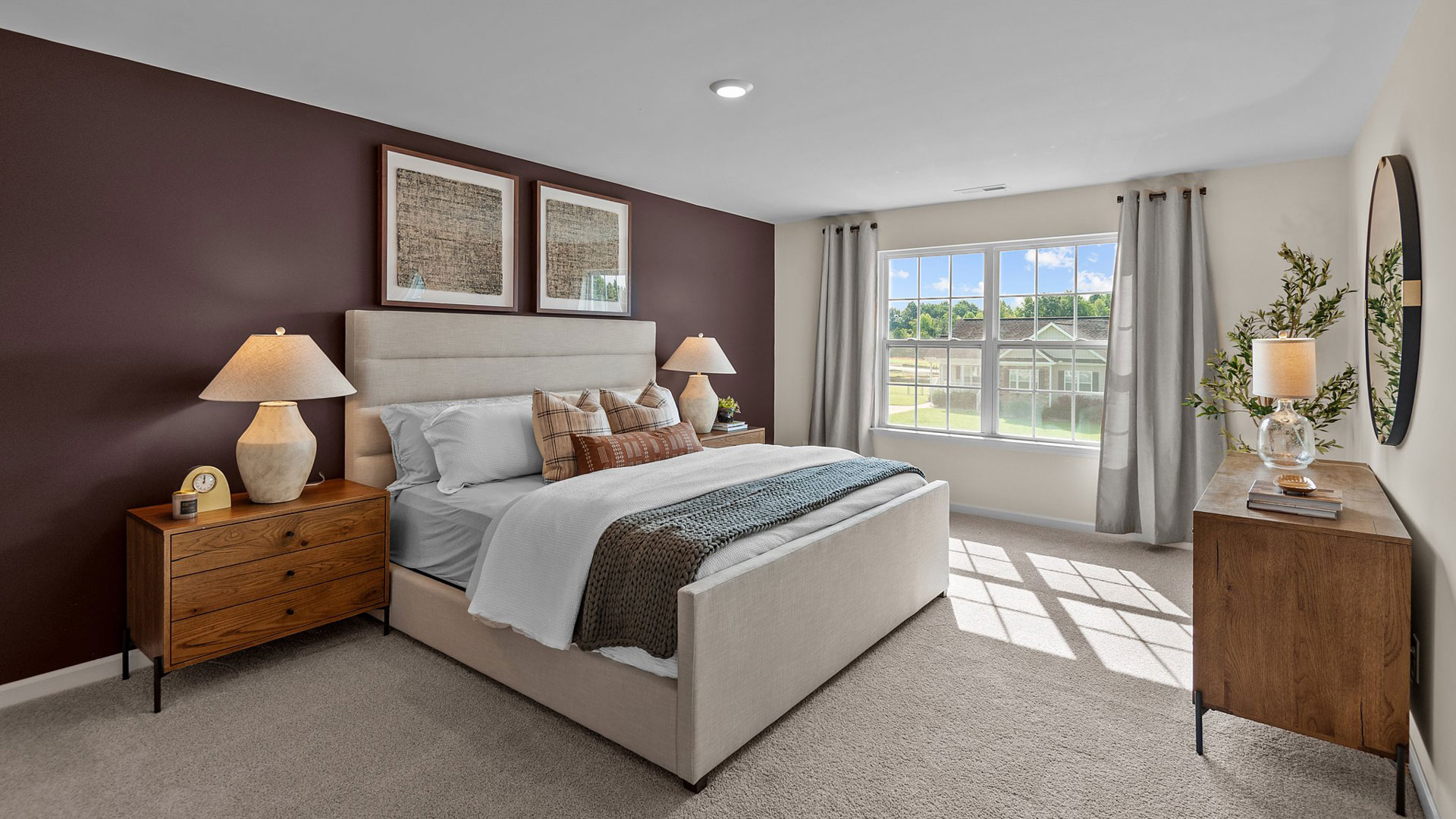 Bedroom with natural lighting and carpet flooring
