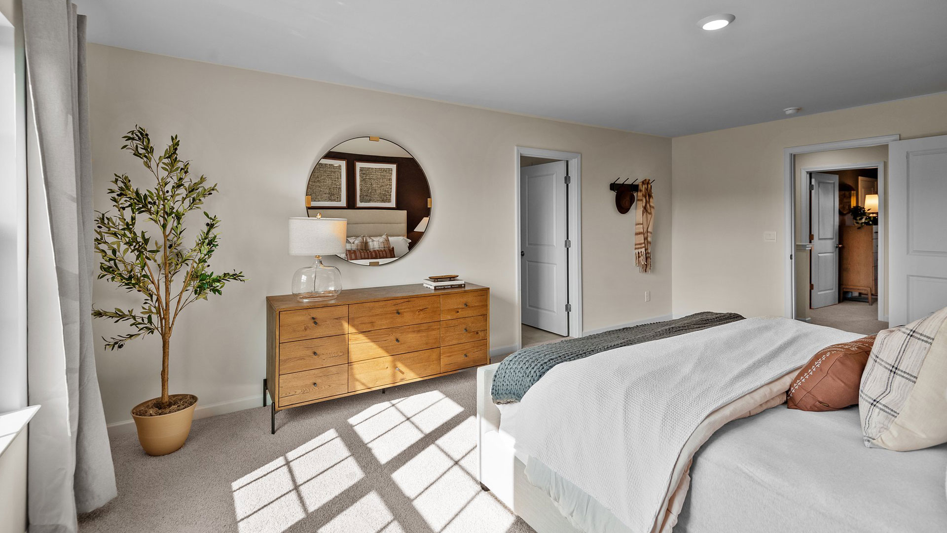 Bedroom with natural lighting and carpet flooring