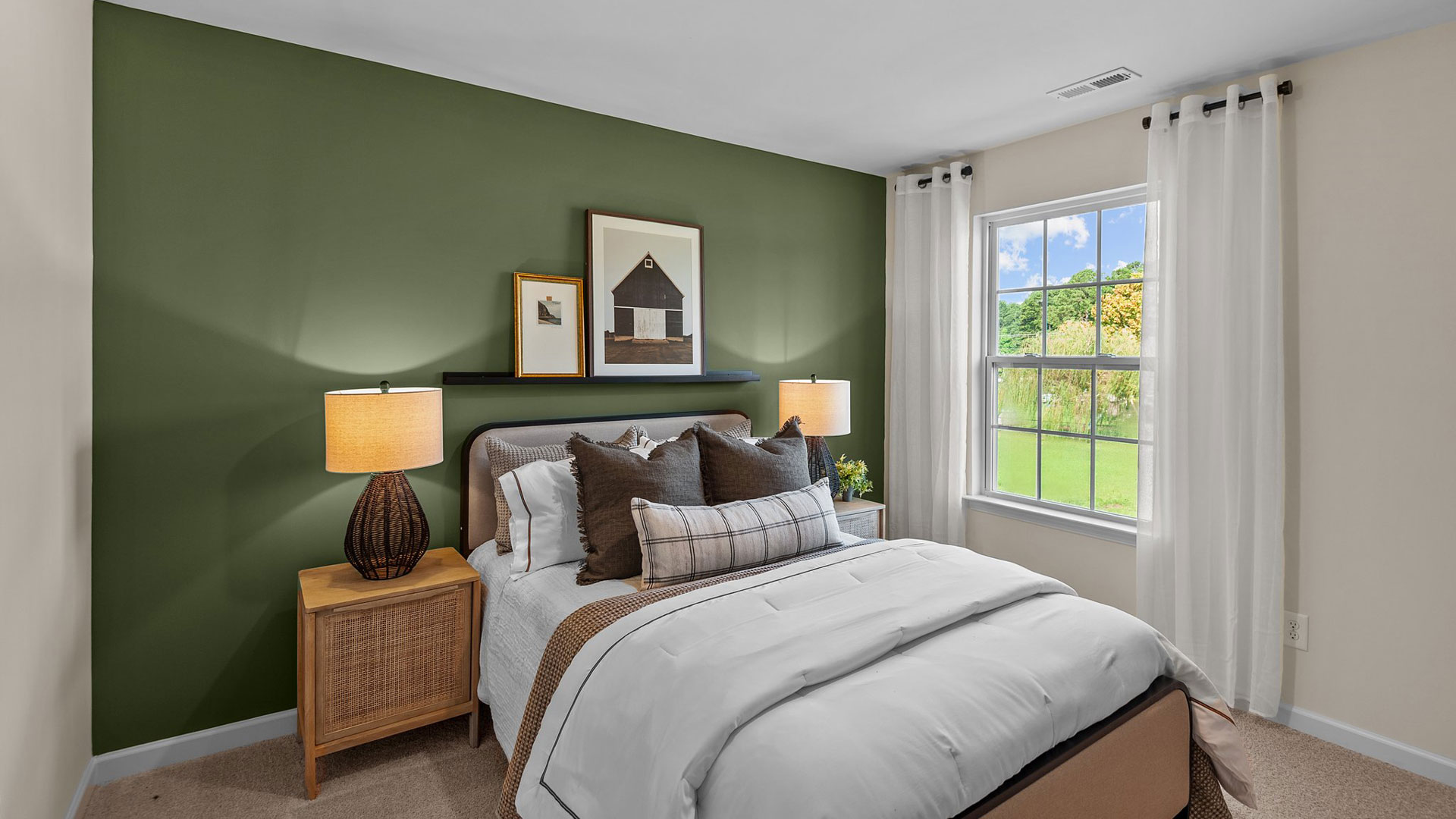 Bedroom with natural lighting and carpet flooring