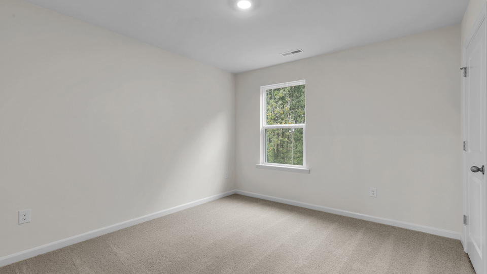 Bedroom with carpet