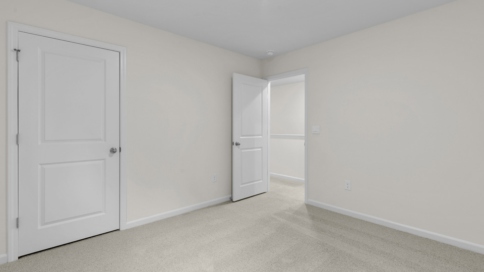 Bedroom with carpet