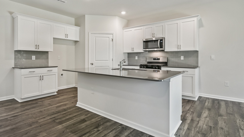 Kitchen with white cabinets