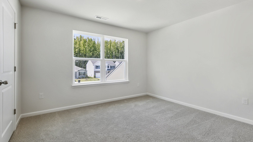 Bedroom with carpet
