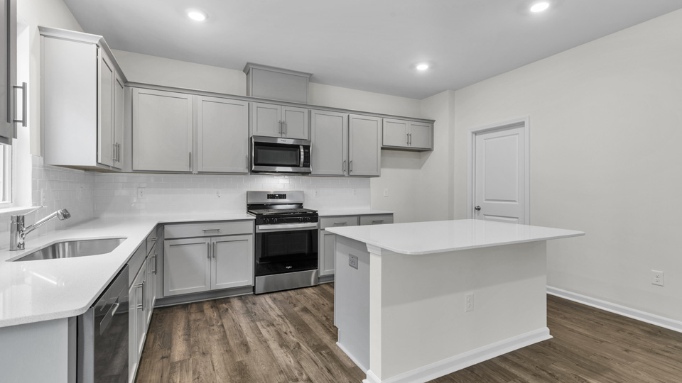 Kitchen with grey cabinets