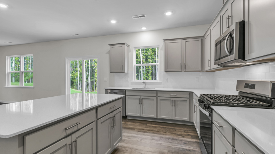 Kitchen with grey cabinets