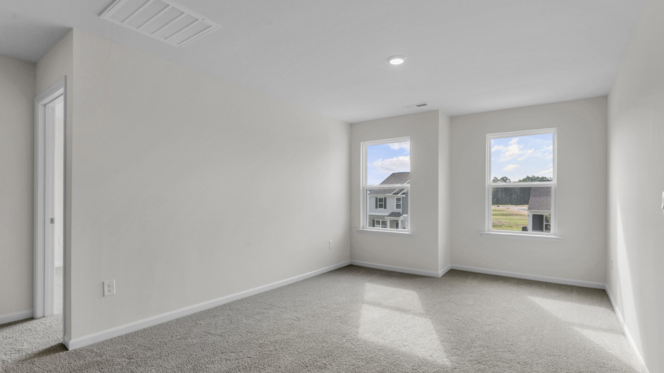 Loft area with carpet