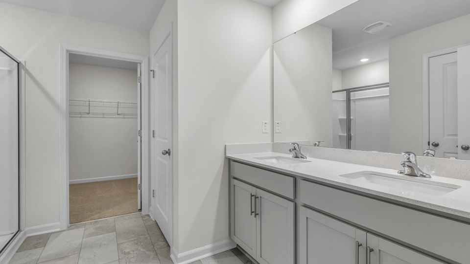 Bathroom with white cabinets
