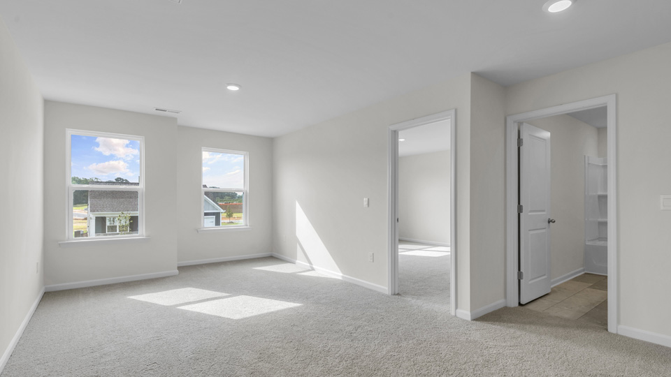 Loft area with carpet