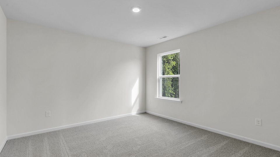 Bedroom with carpet