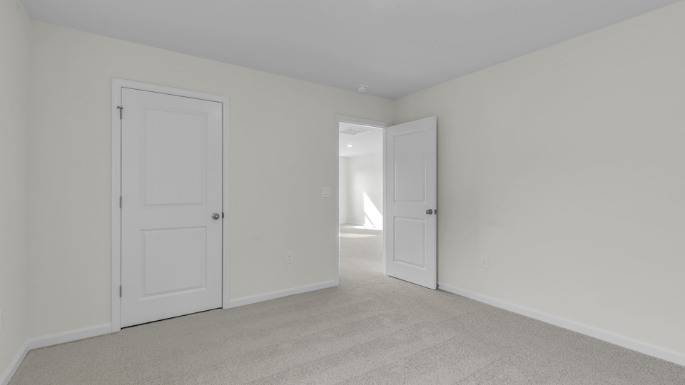Bedroom with carpet