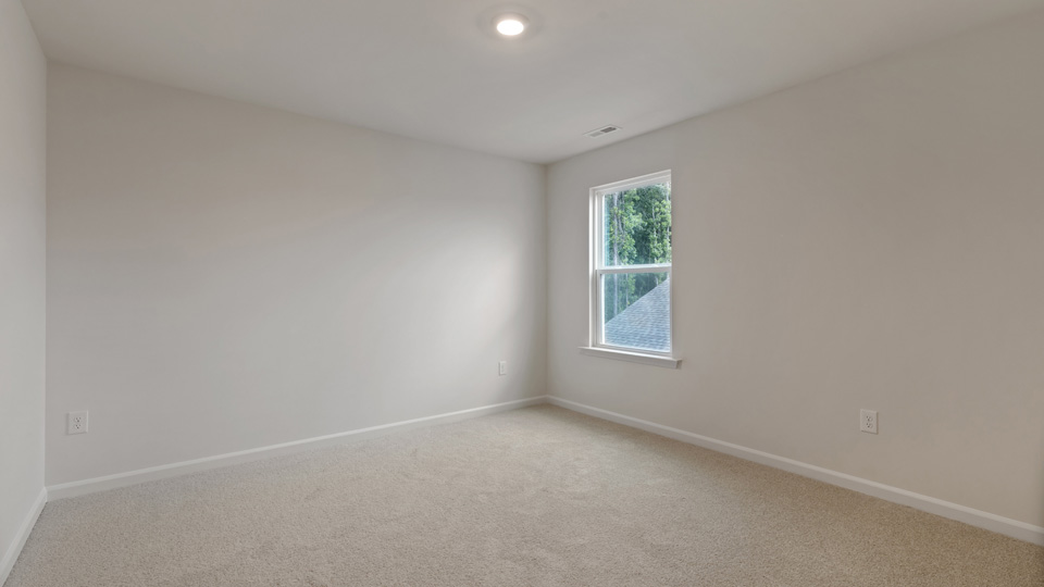 Bedroom with carpet