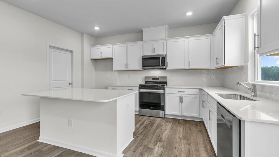 Kitchen with white cabinets