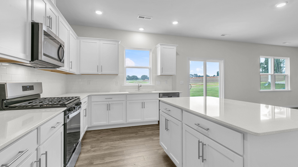 Kitchen with white cabinets