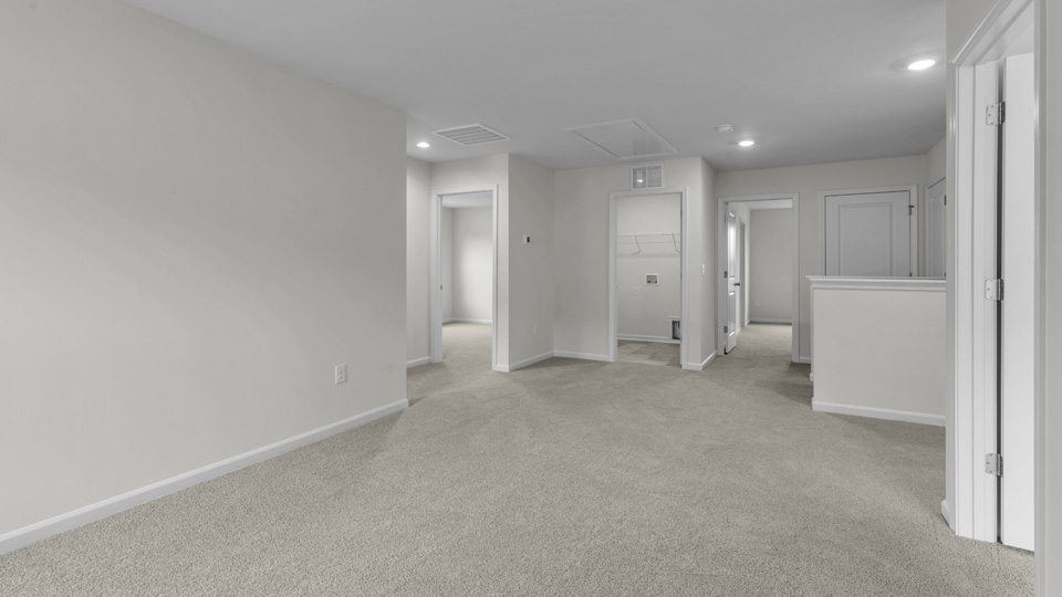 Loft area with carpet