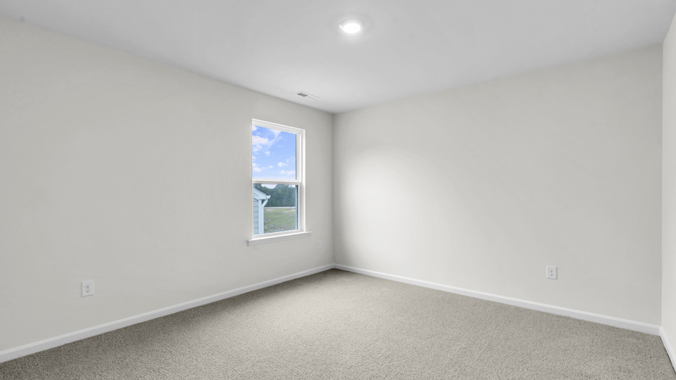 Bedroom with carpet