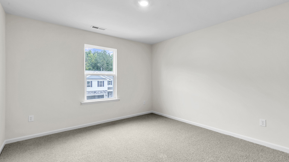 Bedroom with carpet