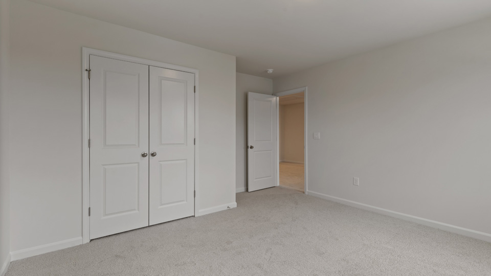 Bedroom with carpet
