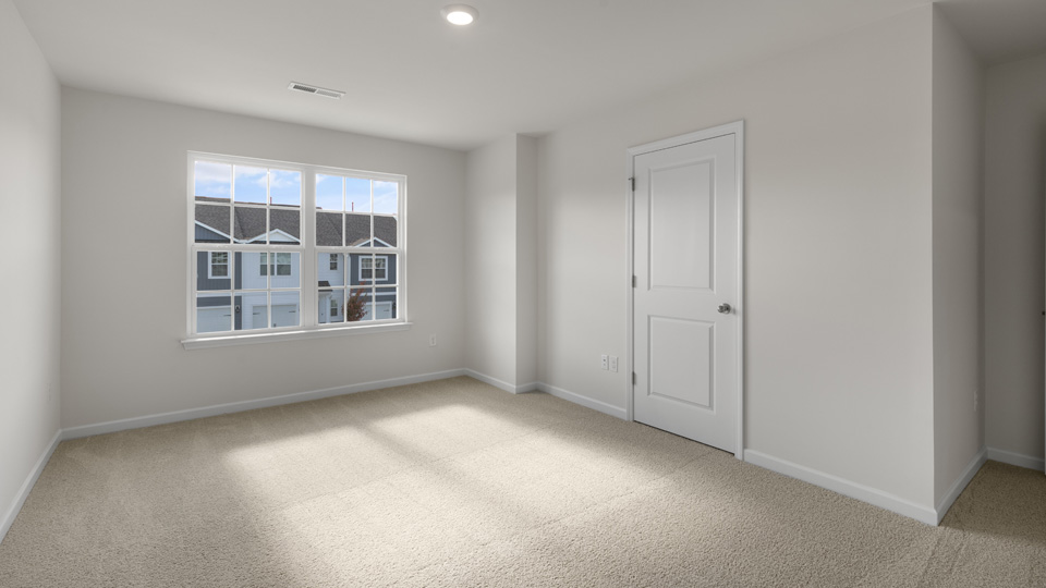 Bedroom with carpet flooring