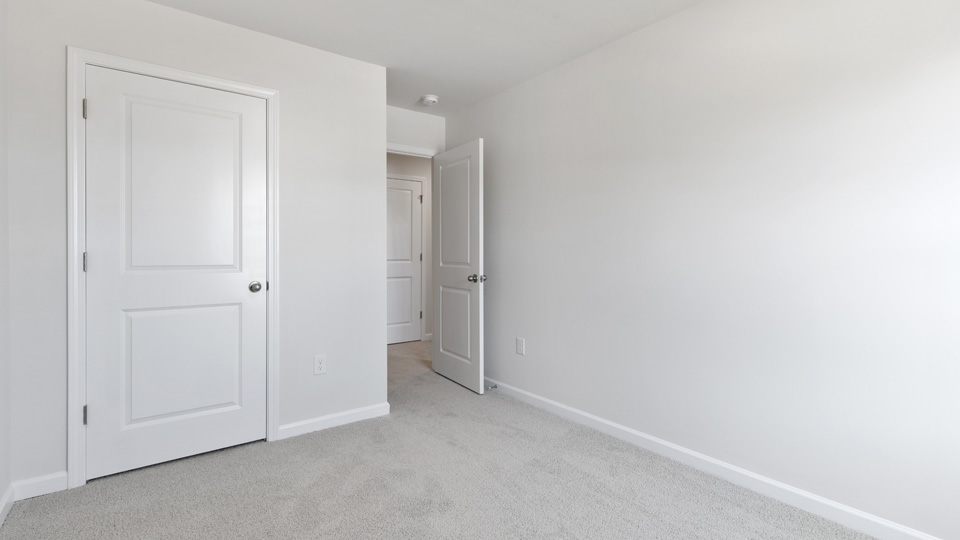 Bedroom with carpet flooring