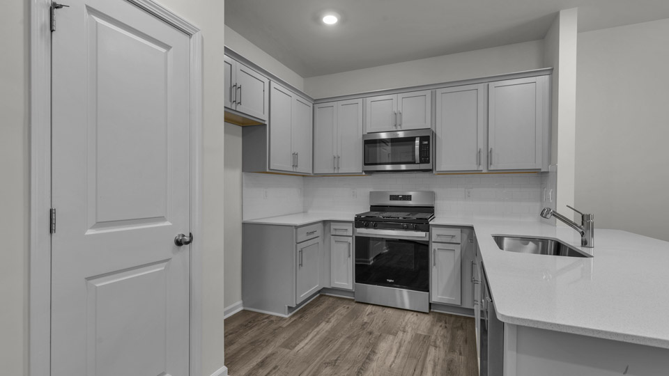 kitchen with quartz countertops and stainless steel appliances