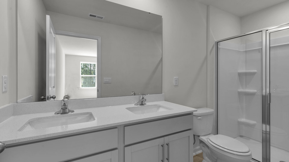 bathroom with quartz countertops