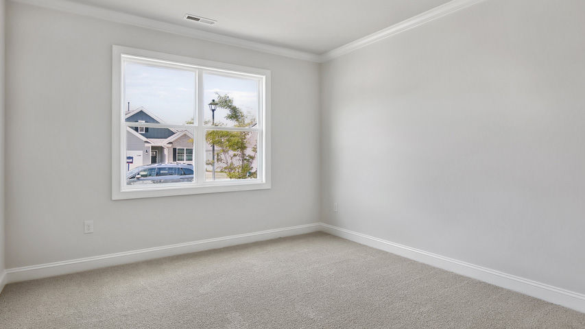 Bedroom with carpet flooring