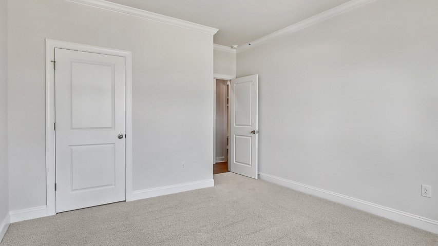 Bedroom with carpet flooring